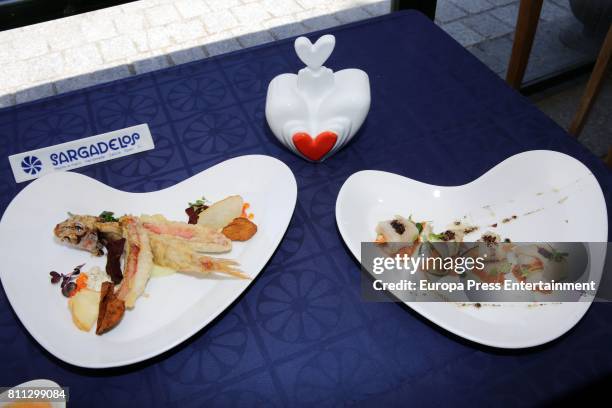 Agatha Ruiz de la Prada and her son Tristan Ramirez de la Prada present the Sargadelos dinnerware set handmade by Agatha Ruiz de la Prada firm at...