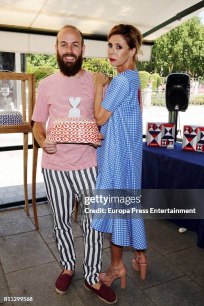 Agatha Ruiz de la Prada and her son Tristan Ramirez de la Prada present the Sargadelos dinnerware set handmade by Agatha Ruiz de la Prada firm at...