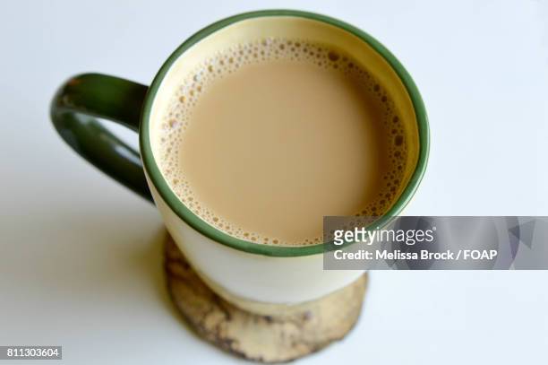 mug of coffee on a wooden coaster - coaster stock pictures, royalty-free photos & images