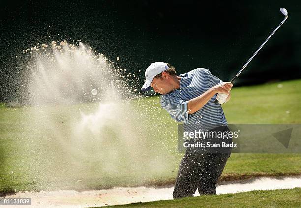 Actor Greg Kinnear hits out of the bunker on the 18th green during the third round of the BMW Charity Pro-Am at Thornblade Club held on May 17, 2008...