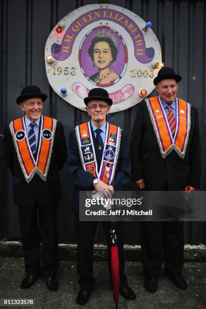 Members of the Orange Order hold a prayer service during their weekly protest at Drumcree Church on July 9, 2017 in Drumcree, Northern Ireland. The...