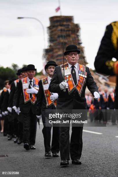 Members of the Orange Order march to Drumcree Church on July 9, 2017 in Drumcree, Northern Ireland. The annual Orange marches and demonstrations will...