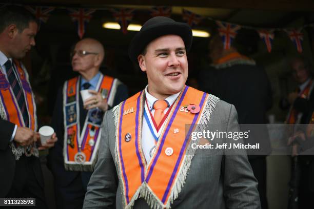 Members of the Orange Order have tea and sandwiches following their weekly march at Drumcree Church on July 9, 2017 in Drumcree, Northern Ireland....