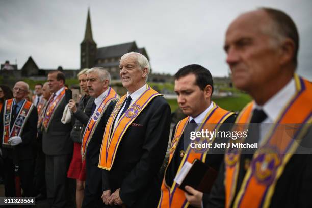 Members of the Orange Order hold a prayer service during their weekly protest at Drumcree Church on July 9, 2017 in Drumcree, Northern Ireland. The...