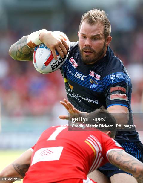 Leeds Rhinos Adam Cuthbertson is tackled by Salford Red Devils' Gareth O'Brien, during the Betfred Super League match at the AJ Bell Stadium, Salford.