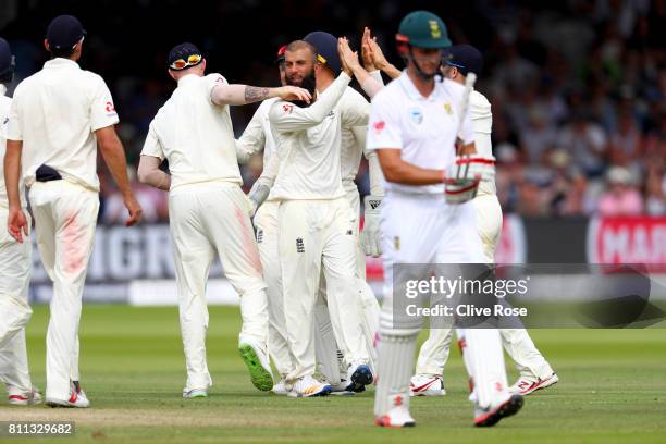 Moeen Ali of England celebrates the wicket of Theunis de Bruyn of South Africa on day four of the 1st Investec Test match between England and South...