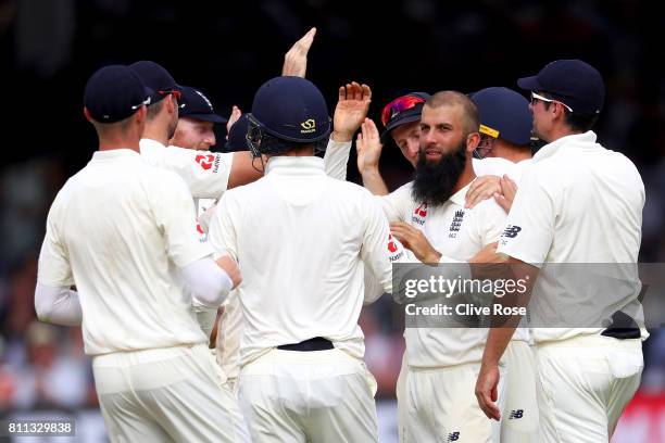 Moeen Ali of England celebrates the wicket of Theunis de Bruyn of South Africa on day four of the 1st Investec Test match between England and South...