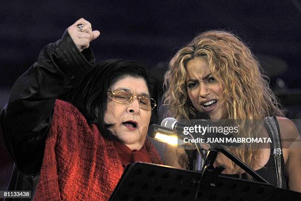 Colombian singer Shakira and Argentine singer Mercedes Sosa perform during a charity concert held in Buenos Aires on May 17, 2008. Shakira's ALAS...
