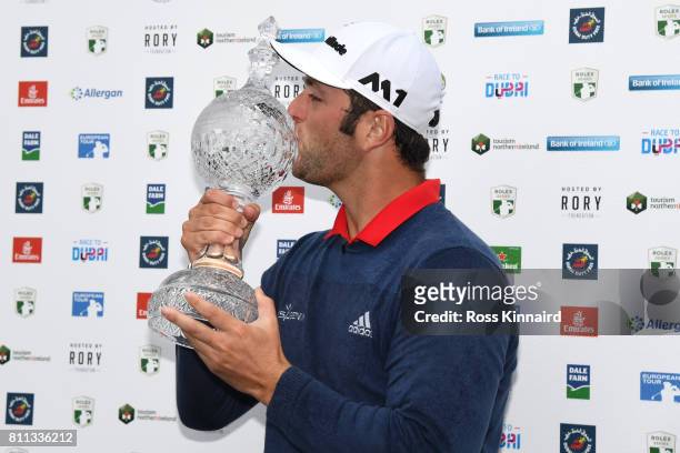Jon Rahm of Spain kisses the trophy after his victory during the final round of the Dubai Duty Free Irish Open at Portstewart Golf Club on July 9,...