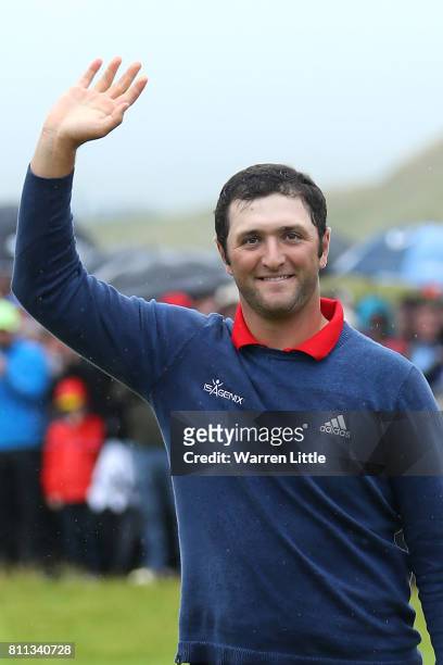 Jon Rahm of Spain acknowledges the crowd on the 18th green after his victory during the final round of the Dubai Duty Free Irish Open at Portstewart...