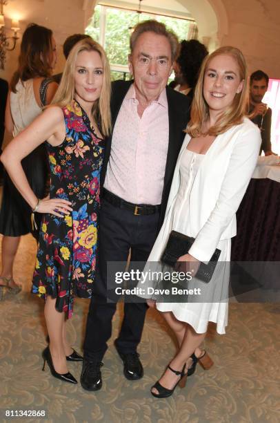 Lord Andrew Lloyd Webber poses with daughters Imogen Lloyd Webber and Isabella Aurora Lloyd Webber at The South Bank Sky Arts Awards drinks reception...