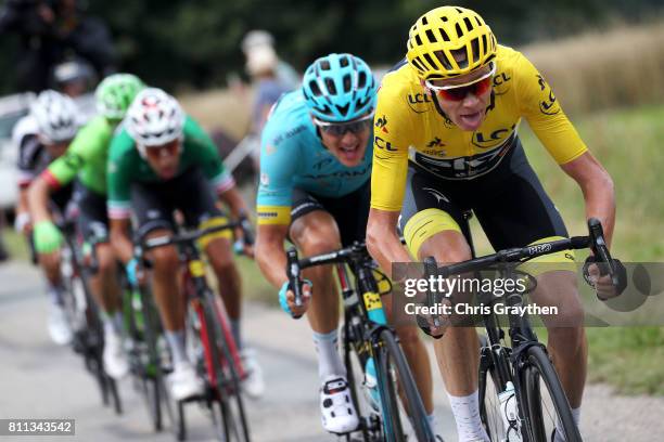 Christopher Froome of Great Britain riding for Team Sky in the leader's jersey rides at the front on the lower slopes of Mont du Chat during stage 9...