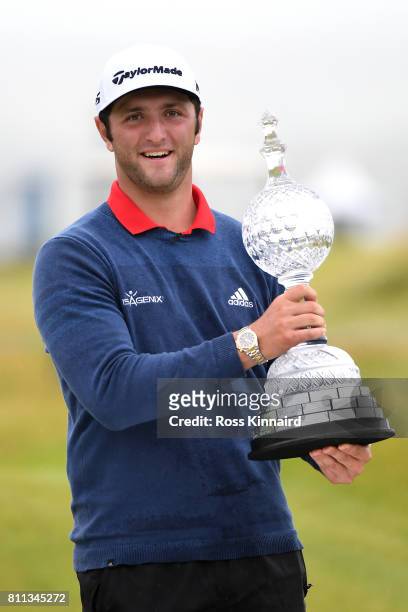 Jon Rahm of Spain poses with the trophy after his victory during the final round of the Dubai Duty Free Irish Open at Portstewart Golf Club on July...