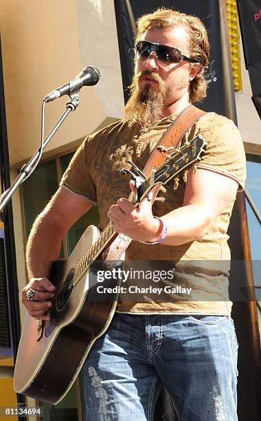 Musician Jamey Johnson performs during the Academy of Country Music Celebrity Motorcycle Ride In & Concert on Fremont Street on May 17, 2008 in Las...