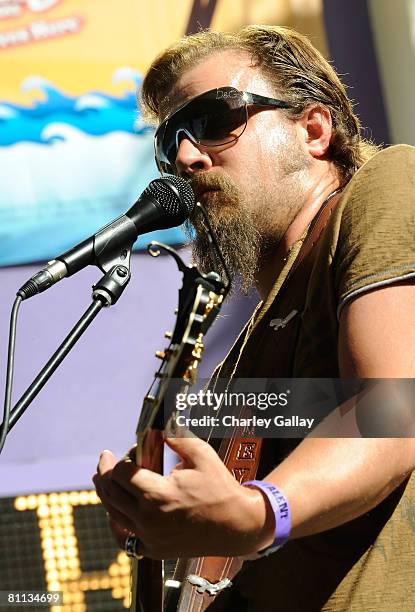 Musician Jamey Johnson performs during the Academy of Country Music Celebrity Motorcycle Ride In & Concert on Fremont Street on May 17, 2008 in Las...