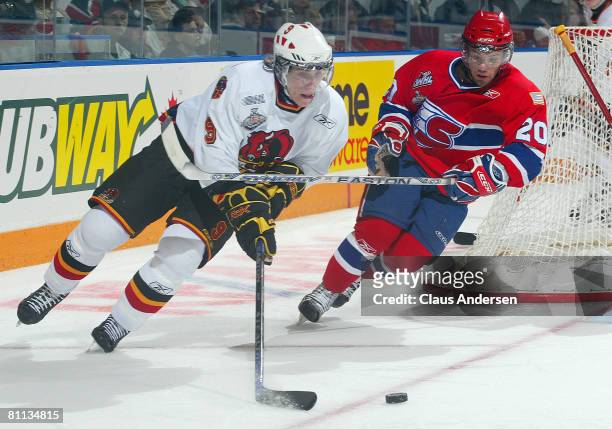 Shawn Lalonde of the Belleville Bulls skates away from David Rutherford of the Spokane Chiefs in the second game of the Memorial Cup Championship on...