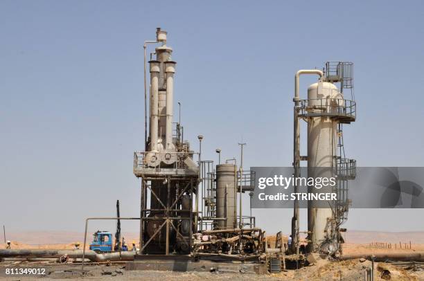 Picture taken on July 9, 2017 shows Syria's Arak gas field, 35 kilometres northeast of the ancient city of Palmyra, in the central province of Homs,...