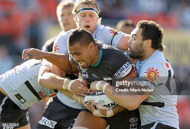 Frank Pritchard of the Panthers is tackled during the round 10 NRL match between the Penrith Panthers and the Warriors at CUA Stadium on May 18, 2008...