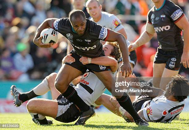 Rhys Wesser of the Panthers is tackled during the round 10 NRL match between the Penrith Panthers and the Warriors at CUA Stadium on May 18, 2008 in...