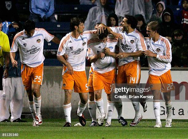 Brian Ching, Kyle Brown, Bobby Boswell, Dwayne De Rosario and Stuart Holden of the Houston Dynamo celebrate Bosewell's goal during the second half...