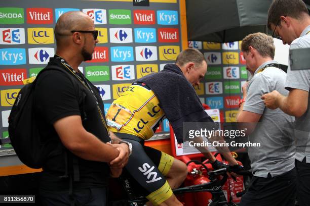 Christopher Froome of Great Britain riding for Team Sky in the leader's jersey cools down following stage 9 of the 2017 Le Tour de France, a 181.5km...