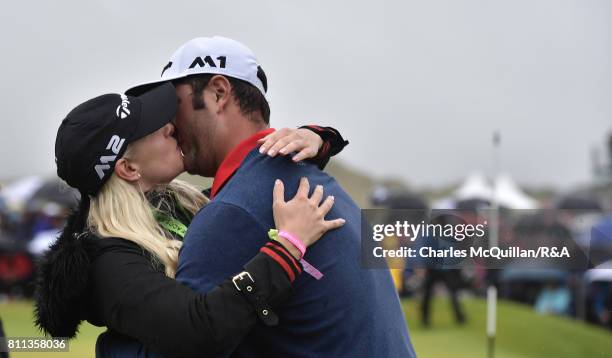 Jon Rahm of Spain kisses his wife on the 18th green after winning the Dubai Duty Free Irish Open hosted by the Rory Foundation at Portstewart Golf...