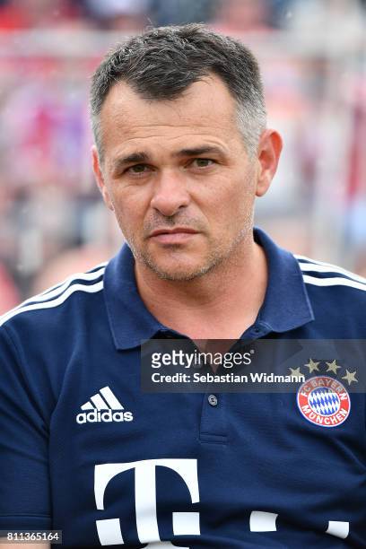 Assistant coach Willy Sagnol of FC Bayern Muenchen waits for the start of the preseason friendly match between FSV Erlangen-Bruck and Bayern Muenchen...