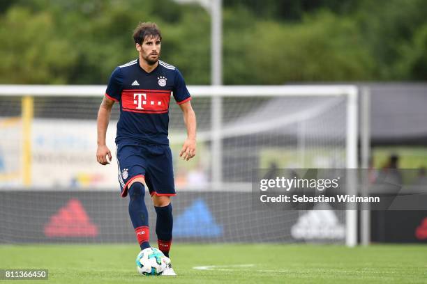 Javier Martinez of FC Bayern Muenchen plays the ball during the preseason friendly match between FSV Erlangen-Bruck and Bayern Muenchen at Adi...
