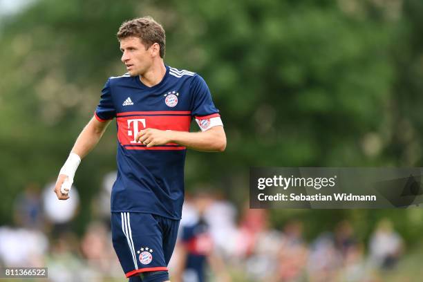 Thomas Mueller of FC Bayern Muenchen looks over his shoulder during the preseason friendly match between FSV Erlangen-Bruck and Bayern Muenchen at...