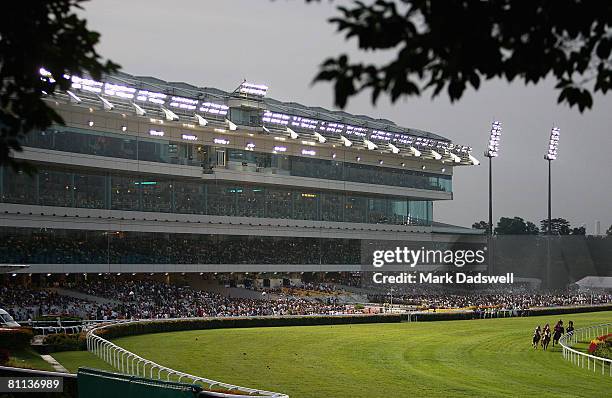 The field race in to the first bend in Race Seven the Moonee Valley Racing Club Trophy during the Singapore Airlines International Cup meeting at...