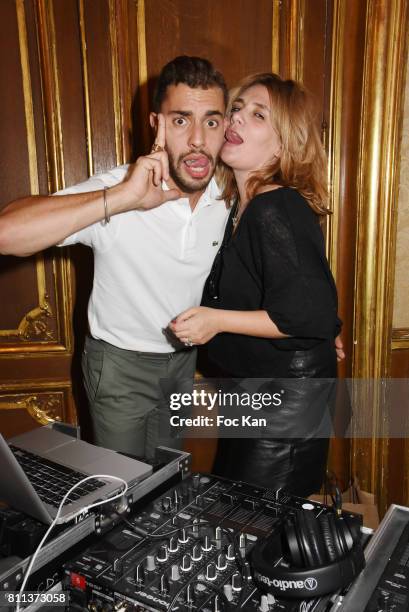 Comedian Marwan Berreni and singer/DJ Marie Amelie Seigner attend Le Jardin L'Experience Party at Le Jardin D'Artois on July 8, 2017 in Paris, France.