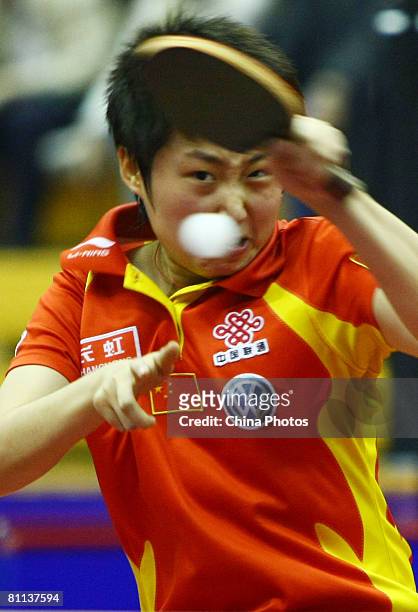 Guo Yue of China returns a shot against compatriot Zhang Yining during the final of Women's Singles Competition of the 2008 ITTF China Table Tennis...