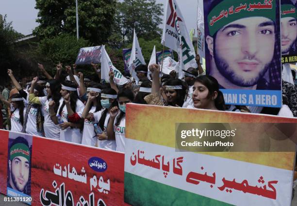 Members of a non-governmental organization 'Youth Forum for Kashmir' chant anti Indian slogans during a rally to mark 1st anniversary of the death of...