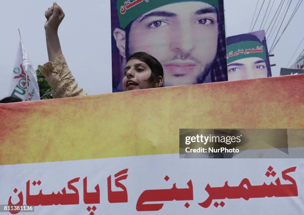 Members of a non-governmental organization 'Youth Forum for Kashmir' chant anti Indian slogans during a rally to mark 1st anniversary of the death of...