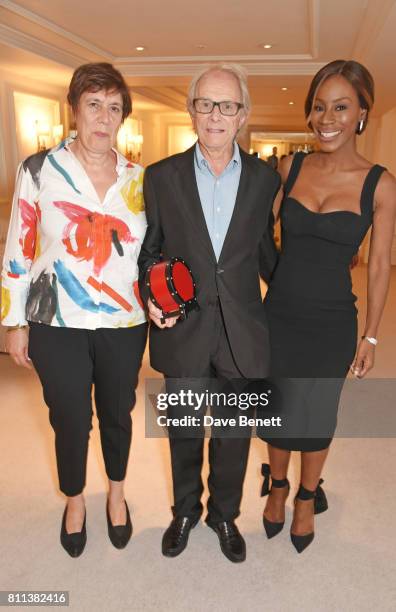 Producer Rebecca O'Brien and director Ken Loach, winners of the Film award for "I, Daniel Blake", pose with presenter Amma Asante in the winners room...