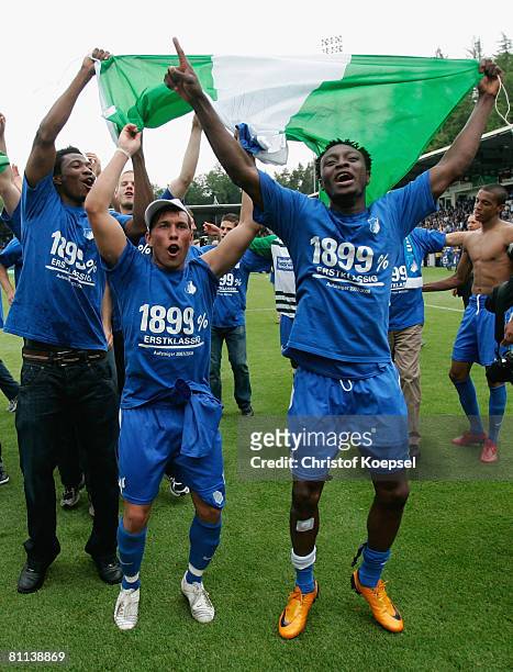 Tobias Weis and Chinedu Obasi of Hoffenheim celebrate the ascension to the First Bundesliga after winning 5-0 the Second Bundesliga match between...