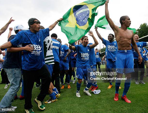 Carlos Eduardo, Tobias Weis, Chinedu Obasi and Marvin Compper of Hoffenheim celebrate the ascension to the First Bundesliga after winning 5-0 the...