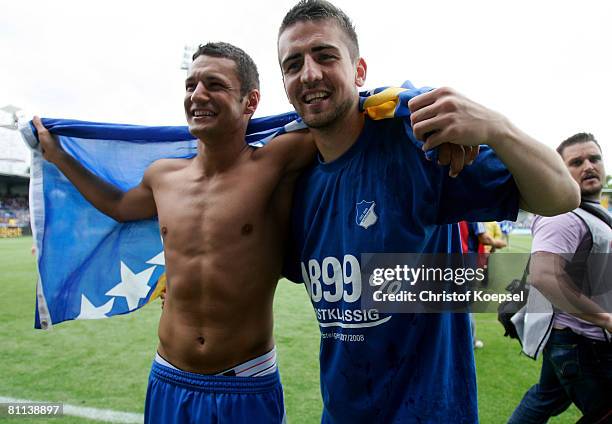 Zsolt Loew and Dragan Paljic of Hoffenheim celebrate the ascension to the First Bundesliga after winning 5-0 the Second Bundesliga match between 1899...