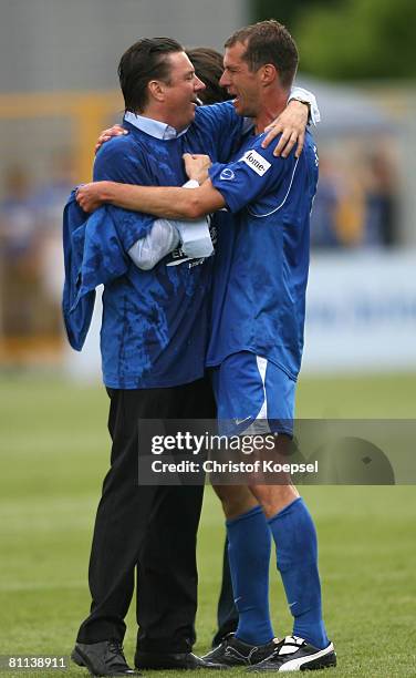 Chief executive officer Jochen Rotthaus and Jochen Seitz of Hoffenheim celebrate the ascension to the First Bundesliga after winning 5-0 the Second...