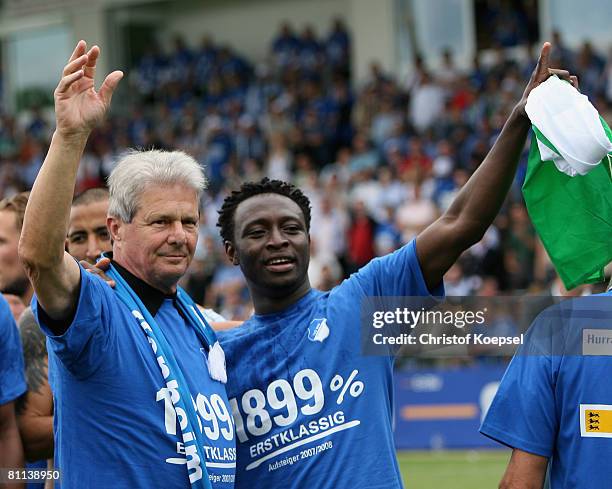 Dietmar Hopp and Chinedu Obasi of Hoffenheim celebrate the ascension to the First Bundesliga after winning 5-0 the Second Bundesliga match between...