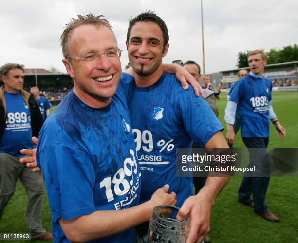 Head coach Ralf Rangnick and Ramazan Oezcan of Hoffenheim celebrate the ascension to the First Bundesliga after winning 5-0 the Second Bundesliga...