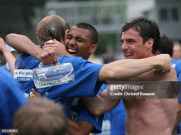 Andreas Ibertsberger, Marvin Compper and Zsolt Loew of Hoffenheim celebrate the ascension to the First Bundesliga after winning 5-0 the Second...