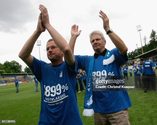 Head coach Ralf Rangnick and Dietmar Hopp of Hoffenheim celebrate the ascension to the First Bundesliga after winning 5-0 the Second Bundesliga match...