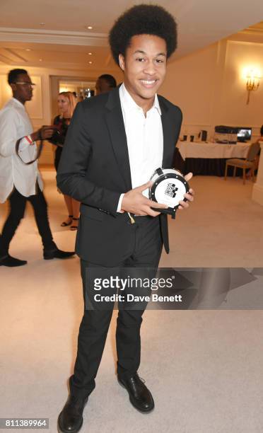 Sheku Kanneh-Mason, winner of the Times Breakthrough award, poses in the winners room at The South Bank Sky Arts Awards at The Savoy Hotel on July 9,...