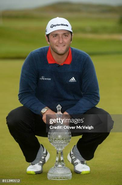 Portstewart , United Kingdom - 9 July 2017; Jon Rahm of Spain with theDubai Duty Free Irish Open trophy on the 18th green on Day 4 of the Dubai Duty...