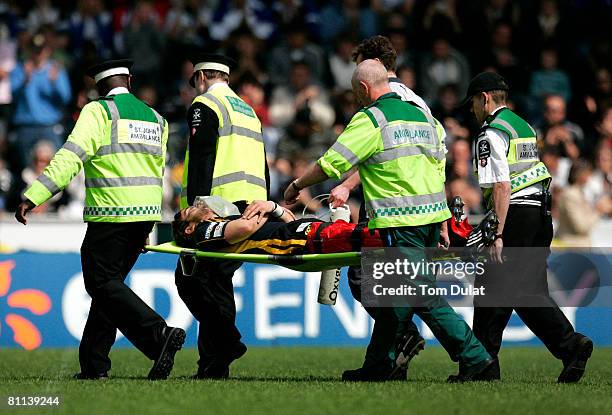 Danny Cipriani of London Wasps is stretchered off after dislocating his ankle during the Guinness Premiership Semi Final match between London Wasps...