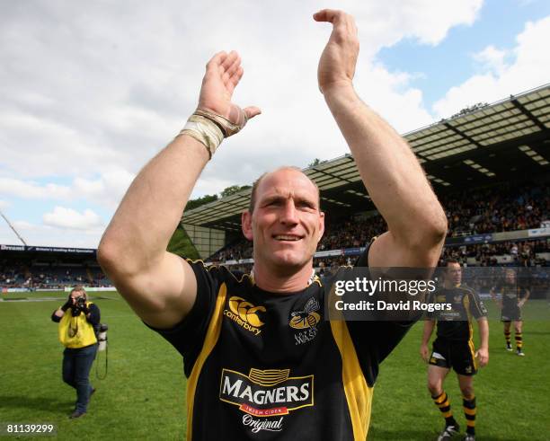 Lawrence Dallaglio, the Wasps captain, waves to the crowd after their victory during the Guinness Premiership semi final playoff match between London...