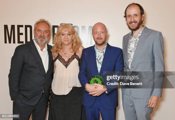 Presenter Sam Mendes poses with director John Tiffany, producer Sonia Friedman and writer Jack Thorne, winners of the Theatre award for "Harry Potter...