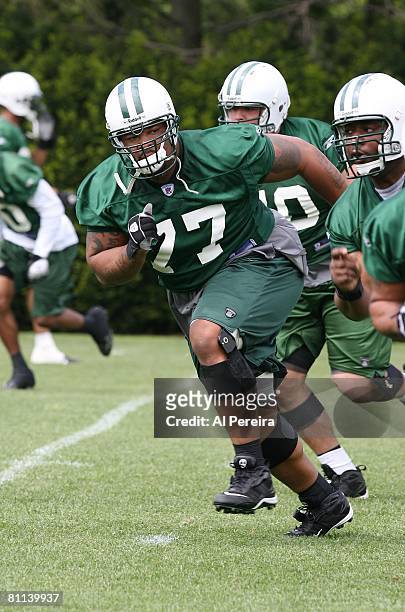 Defensive Tackle Kris Jenkins of the New York Jets follows the play in Organized Team Activities at the Jets' Training Facilities, on May 15, 2008 in...