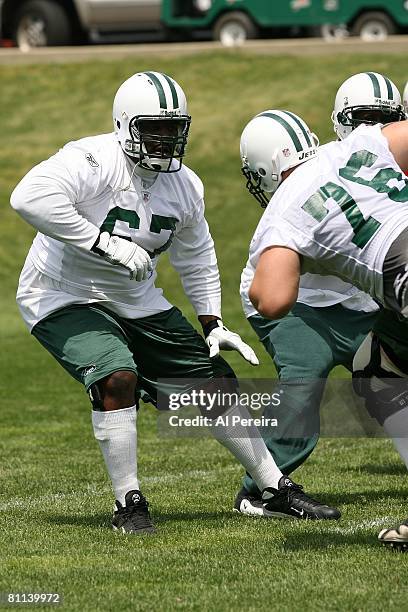 Offensive Lineman Damien Woody of the New York Jets follows the play in Organized Team Activities at the Jets' Training Facilities, on May 15, 2008...